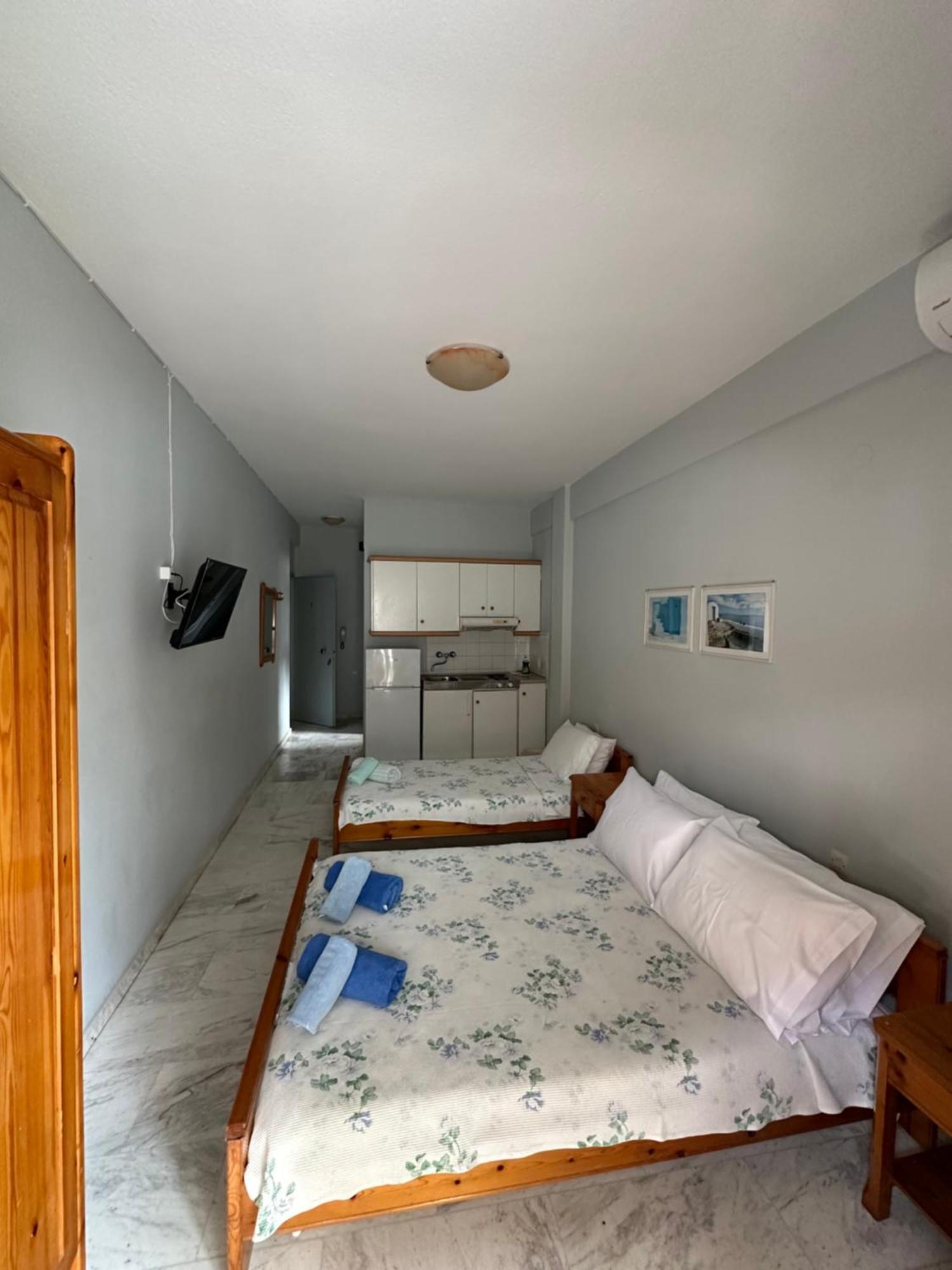 Olympic Beach Rooms Quarto foto